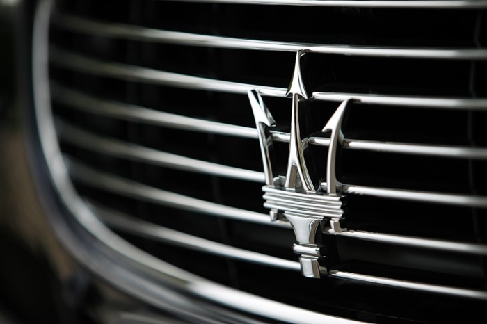 Maserati logotype, emblem, logo on the car